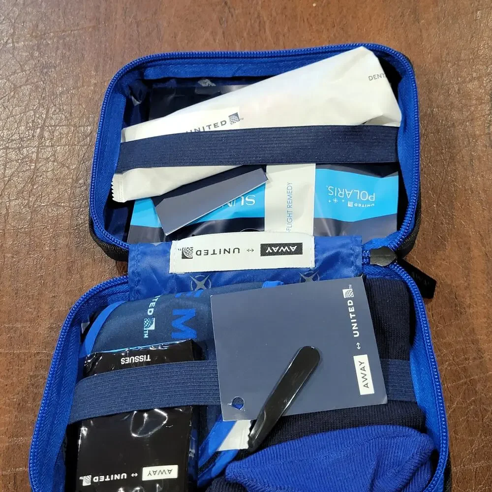 New AWAY Travel The Mini Suitcase Toiletry Case United Polaris Amenity Kit Pouch